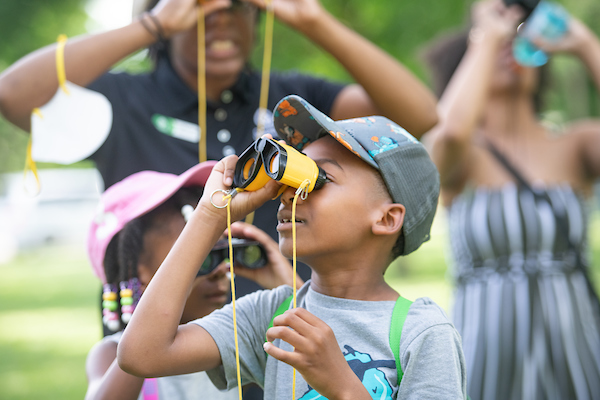 child exploring outdoors